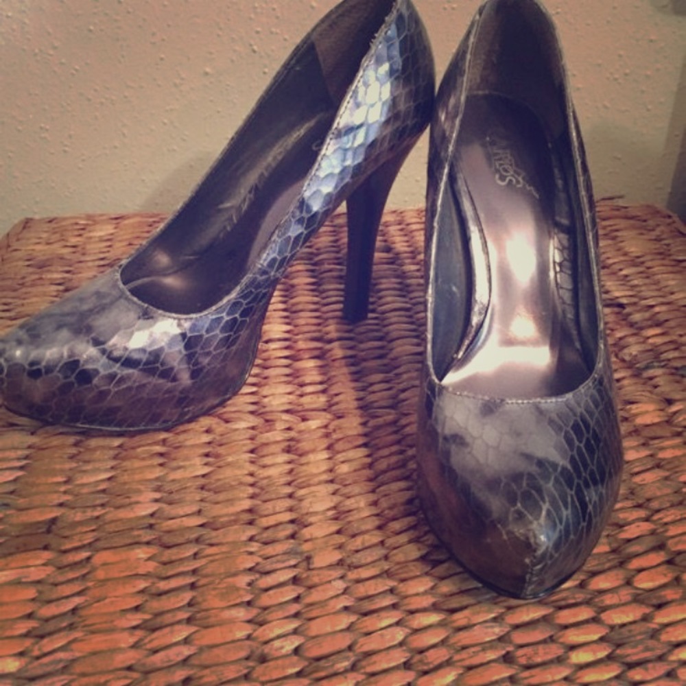 Carlos Santana pewter platforms 8.5
